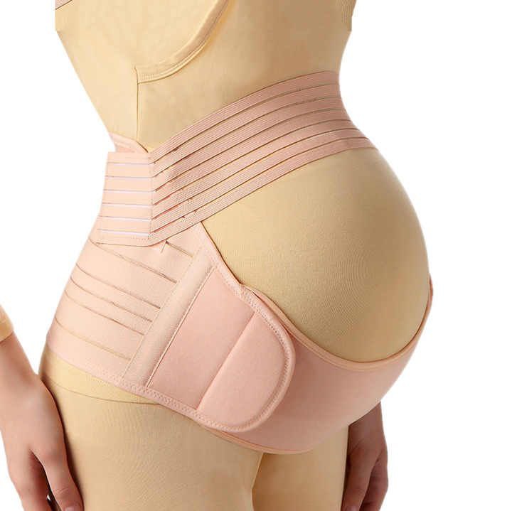 😩 "الحمل فرحة... بصح آلام الظهر والقدمين يخلوك تعاني!"